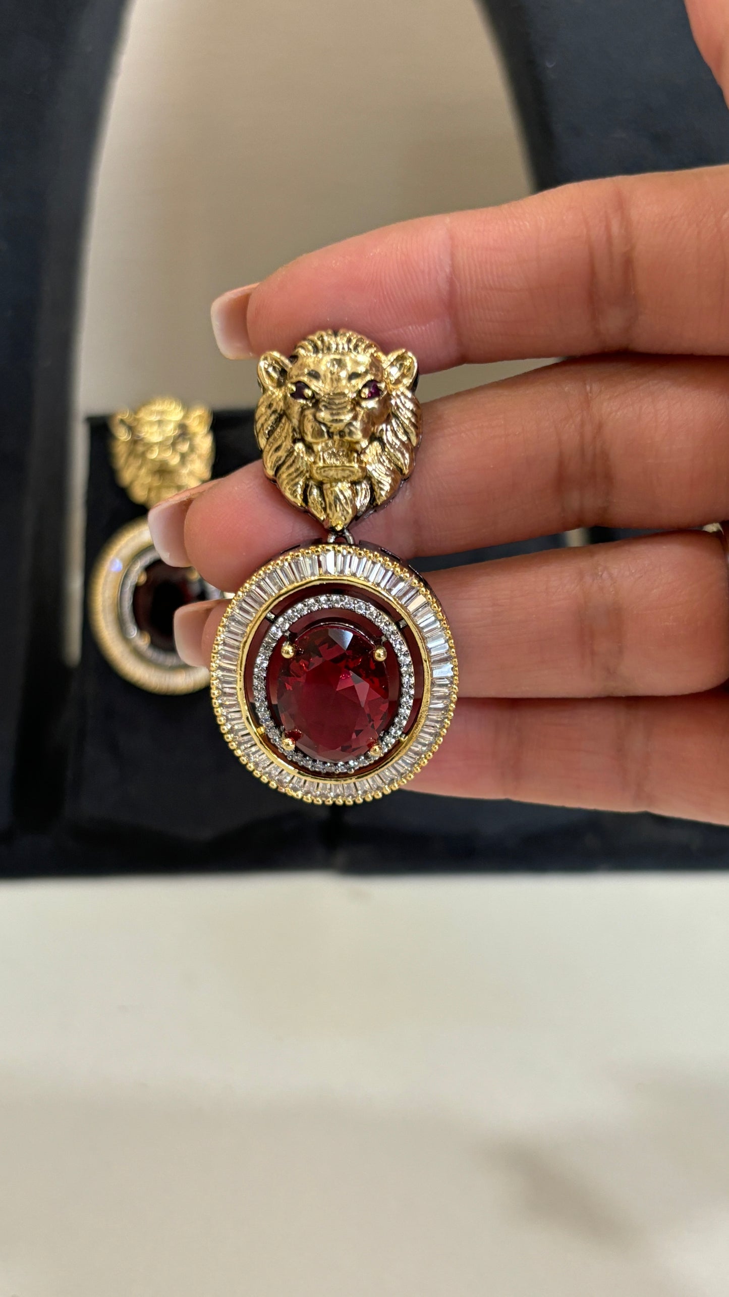 Royal Garnet Lion-Emblem Drop Earrings