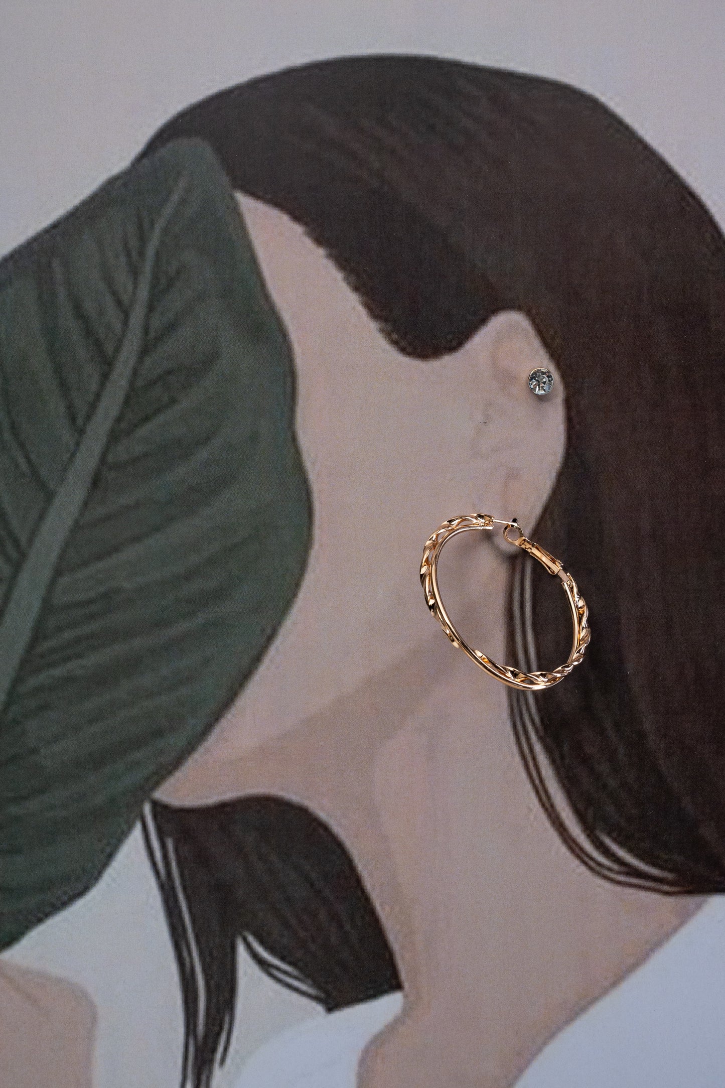 Twisted Gold-Plated Hoops Pairing with Crystal Studds