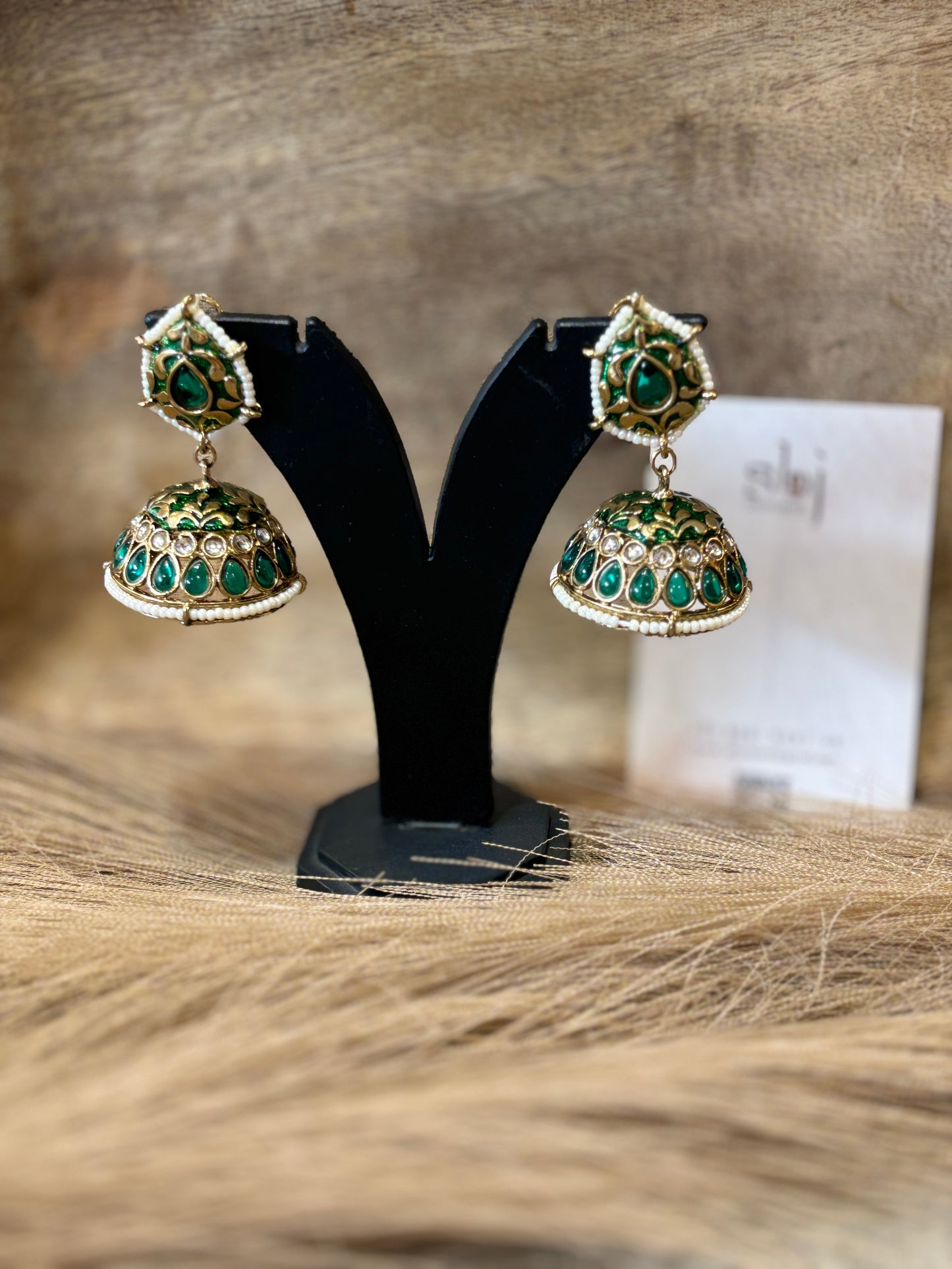 Emerald Kundan Jhumka Earrings with Pearl Detailing