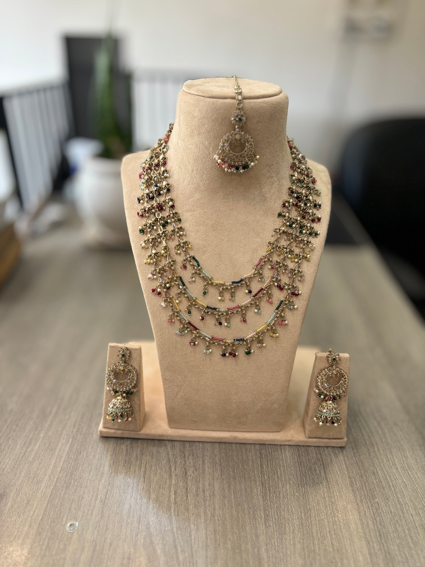 Nooré Rang Layered Multicolor Polki Necklace Set – A Symphony of Hues