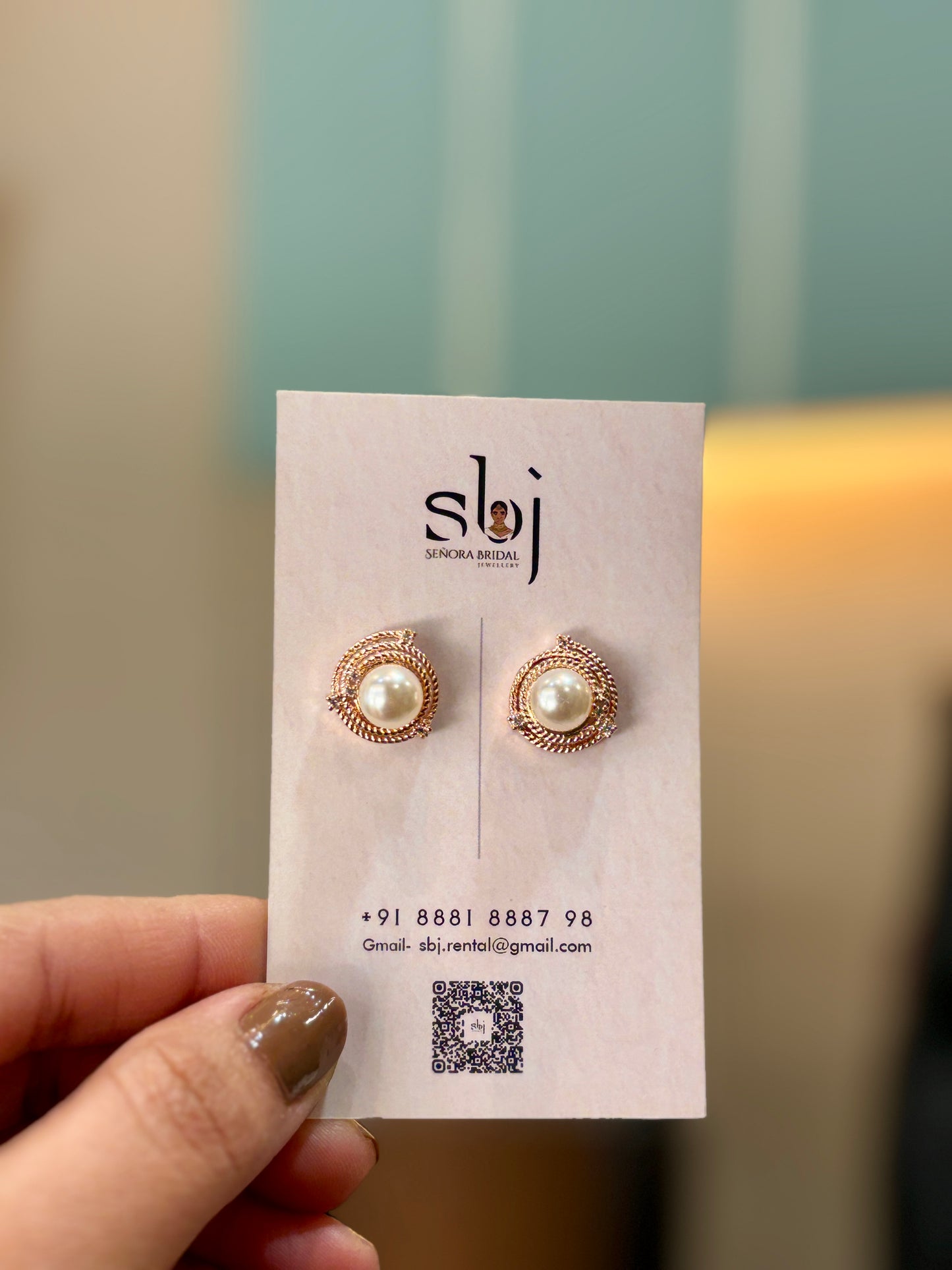 Gold Swirl Pearl Stud Earrings with Textured Halo
